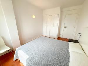 A bed or beds in a room at RHODAS 16