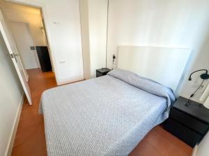 A bed or beds in a room at RHODAS 16