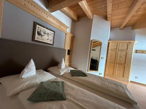 Postel nebo postele na pokoji v ubytování Garnì Villa Erna