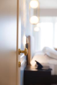 an open door to a bedroom with a bed at Hotel Belvedere in Forte dei Marmi