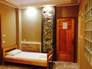 Postel nebo postele na pokoji v ubytování Menis Haus Rooms