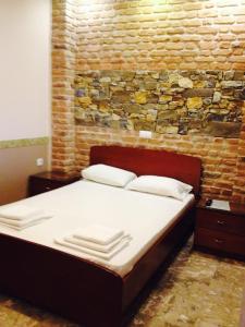 Postel nebo postele na pokoji v ubytování Menis Haus Rooms