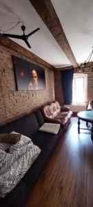 Χώρος καθιστικού στο Apartament loftowy