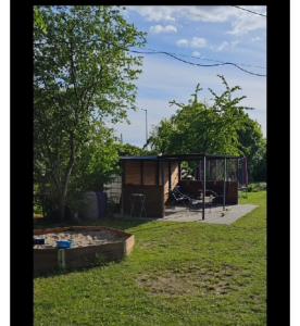 a playground in a park with a building at Apartament Sikorskiego 27 in Ełk +4 photos