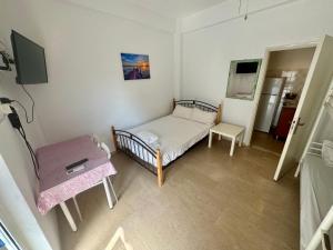 Μια τηλεόραση ή/και κέντρο ψυχαγωγίας στο Seaside Apartments & Rooms Kampouri