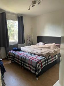 Ένα ή περισσότερα κρεβάτια σε δωμάτιο στο Piekny apartament u Moniki