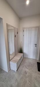 a dressing room with two mirrors and a dressing table at Mint 2 in Veliko Tŭrnovo +15 photos