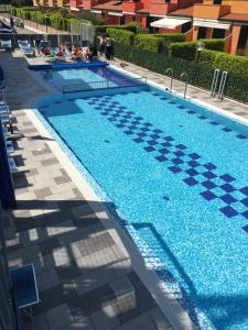 Bazén v ubytovaní Villaggio Hemingway - Family Aparthotel alebo v jeho blízkosti