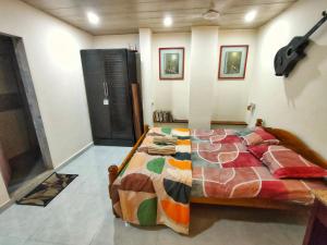Postel nebo postele na pokoji v ubytování Ebony Room - Comfortable Suite