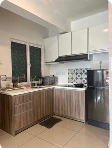 Η κουζίνα ή μικρή κουζίνα στο GA Homes Homestay - Majestic Ipoh Condo
