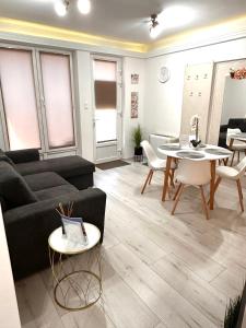 Et opholdsområde på Hello Holiday Apartman