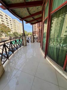 an empty balcony with a view of a city at LUXURY family cottage in Islamabad