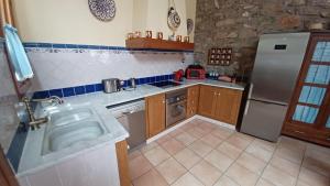 Kuchyň nebo kuchyňský kout v ubytování Casa Tio La Romana Orangecosta + 21 fotografií