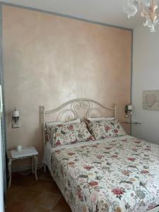 Postel nebo postele na pokoji v ubytování B&B La Casa sul Colle