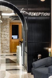 Ο χώρος του λόμπι ή της ρεσεψιόν στο Casa Rosa