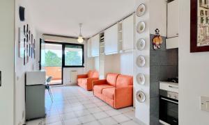 Køkken eller tekøkken på Bilocale con piscina condominiale