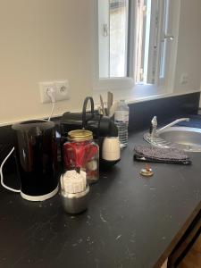 Køkken eller tekøkken på Petit nid douillet centre-ville