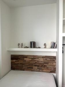 En eller flere senge i et værelse på Petit nid douillet centre-ville