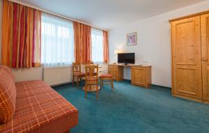 TV a/nebo společenská místnost v ubytování Posthotel Radstadt