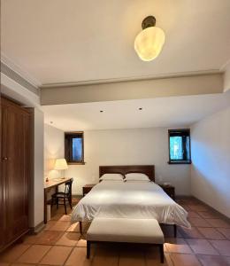 Gulta vai gultas numurā naktsmītnē Xiamen Gulangyu Bishan Residence