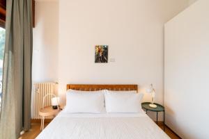 Postel nebo postele na pokoji v ubytování Hill Houses - art & stay - Rome