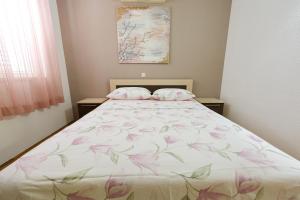 Postel nebo postele na pokoji v ubytování Apartments Avdić