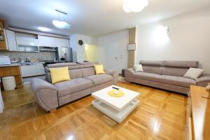 Kuchyň nebo kuchyňský kout v ubytování Apartments Avdić