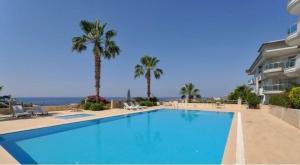 The swimming pool at or close to Zen House with sea views, near Kleopatra beach