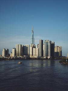 a view of a city with a river and buildings at The Regal Residence at Vinhomes in Ho Chi Minh City