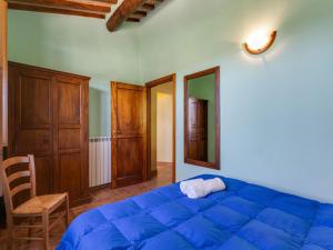 Posteľ alebo postele v izbe v ubytovaní Scenic Apartment in Casole d'Elsa with Pool