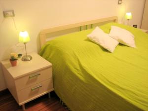 Posteľ alebo postele v izbe v ubytovaní Small residence with swimming pool and 8 lovely apartments