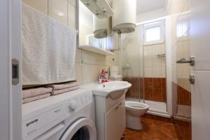 Koupelna v ubytování Apartments Avdić + 37 fotografií