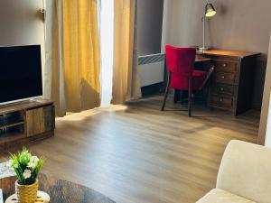 Μια τηλεόραση ή/και κέντρο ψυχαγωγίας στο Appartement de la Gare