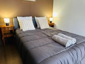 Ένα ή περισσότερα κρεβάτια σε δωμάτιο στο Appartement de la Gare