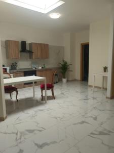 Kuchyň nebo kuchyňský kout v ubytování TMS Venice Rooms