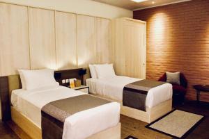 JSI Resort房間的床