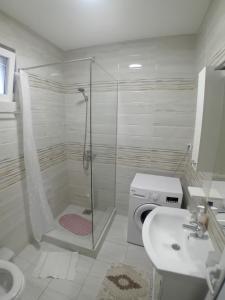 Koupelna v ubytování Apartmani M&V