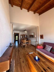 a living room with a couch and a table at Apartamento Margalida en Cerler, Pirineo Huesca in Cerler
