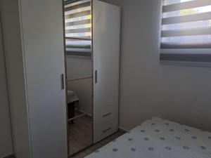 Apartman EXIT-TVRĐAVA客房内的一张或多张床位