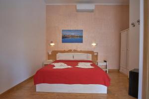 Postel nebo postele na pokoji v ubytování Bel Sole Guest House