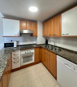 Kuchyň nebo kuchyňský kout v ubytování Home Vila-seca Town