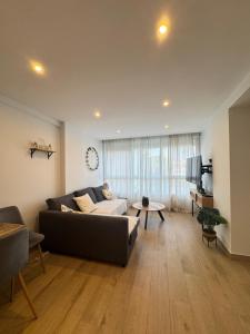 Posezení v ubytování Apartamento Arena + 6 fotografií