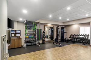 a fitness room with a gym with weights at Hampton Inn Jacksonville Ponte Vedra in Jacksonville Beach
