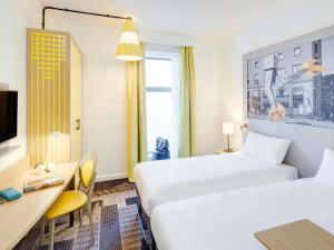 Postel nebo postele na pokoji v ubytování ibis Styles Glasgow Centre George Square