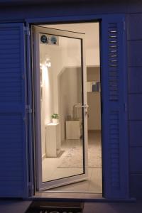 a door with a mirror in a room at Fig Tree in Povlja +100 photos