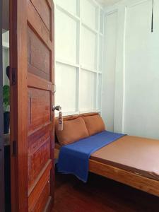 Postel nebo postele na pokoji v ubytování A-Seven House Sagada