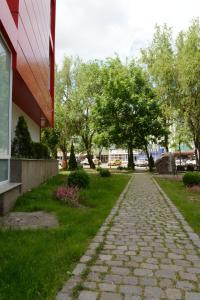 a stone path in front of a building at Hotel Select in Tulcea