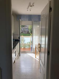 Dapur atau dapur kecil di Duplex en Mogro con vistas expectaculares