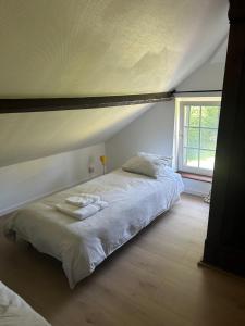 Ein Bett oder Betten in einem Zimmer der Unterkunft The Little House of Spa