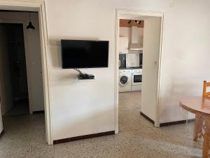 TV a/nebo společenská místnost v ubytování A Rossa Location